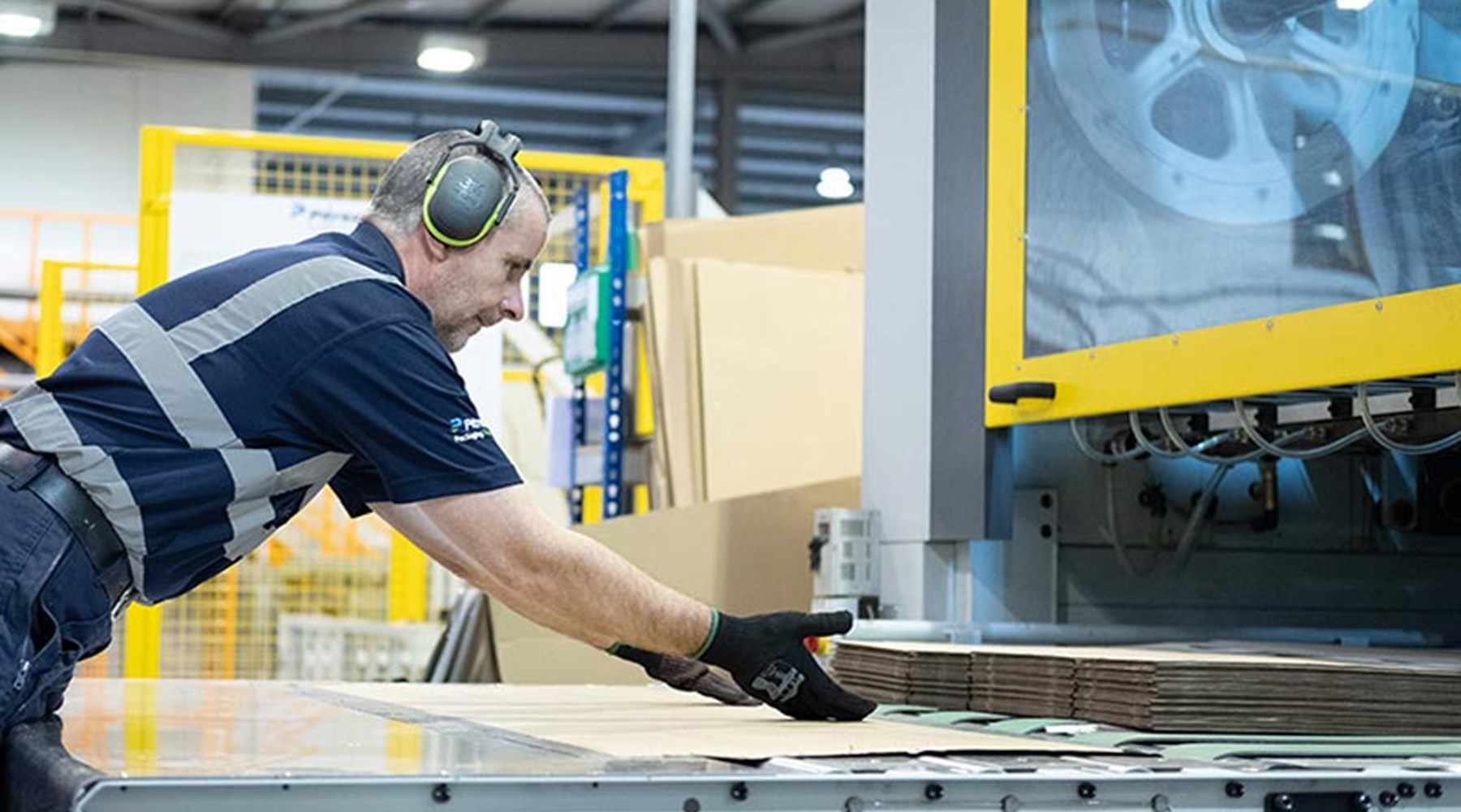 Boxes coming out large die cutting machine